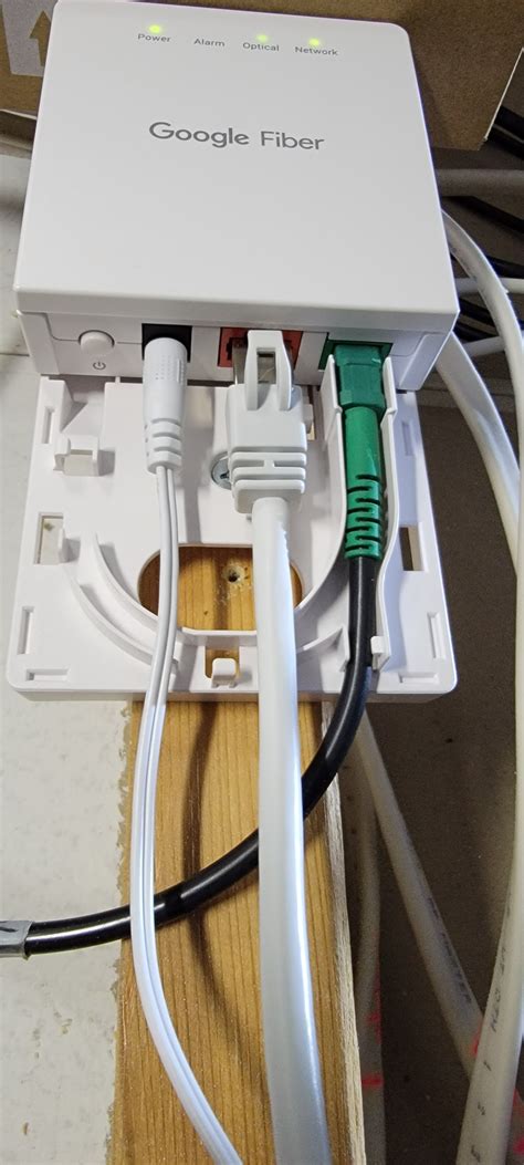 Installs the ONT (Optical Network Terminal) Make sure a grounded outlet is accessible. . How to remove google fiber jack from wall
